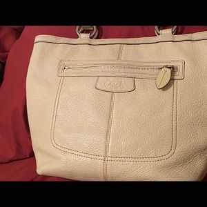 Beautiful tan and pink coach hand bag